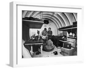 Interior View of Steel Underground Radiation Fallout Shelter Where Couple Relaxes with 3 Children-Walter Sanders-Framed Photographic Print