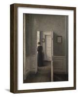 Interior with a woman standing-Vilhelm Hammershoi-Framed Giclee Print