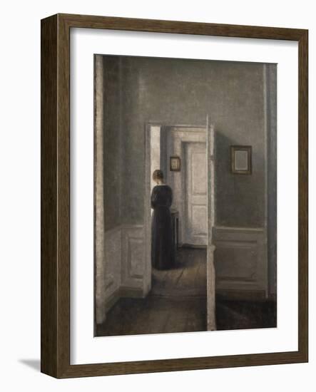 Interior with a woman standing-Vilhelm Hammershoi-Framed Giclee Print