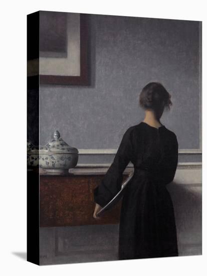 Interior with Young Woman from Behind-Vilhelm Hammershoi-Stretched Canvas