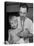 Intern at Minneapolis General Hospital Using Stethoscope to Examine Boy Recovering from Pneumonia-Alfred Eisenstaedt-Stretched Canvas