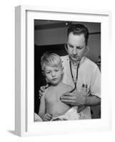 Intern at Minneapolis General Hospital Using Stethoscope to Examine Boy Recovering from Pneumonia-Alfred Eisenstaedt-Framed Photographic Print