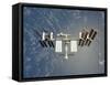 International Space Station Backdropped Against Earth-null-Framed Stretched Canvas