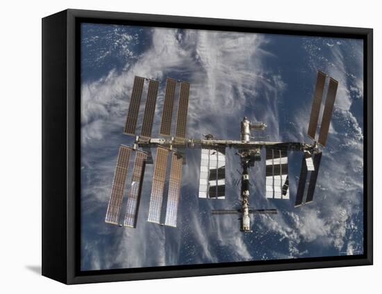 International Space Station Backdropped by a Blue and White Earth-Stocktrek Images-Framed Stretched Canvas
