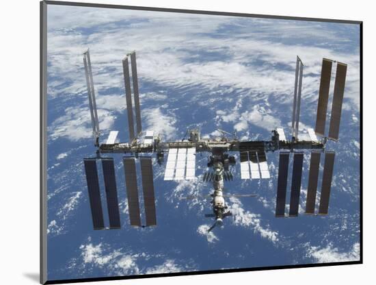 International Space Station in Orbit Above the Earth-null-Mounted Photographic Print