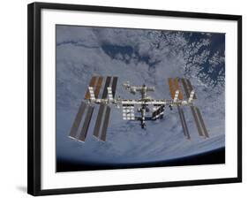 International Space Station Set Against the Background of a Cloud Covered Earth-null-Framed Photographic Print