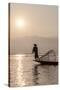 Intha Leg Rowing Fisherman at Dawn Silhouetted Against the Sun, Inle Lake, Nyaungshwe-Stephen Studd-Stretched Canvas