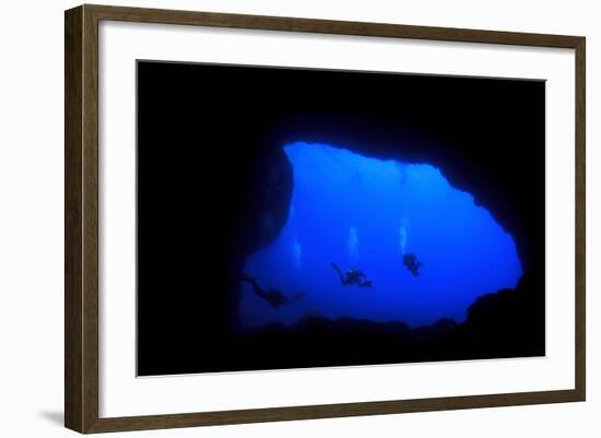 Into Darkness: Underwater Cave Scuba Diving Silhouettes-Rich Carey-Framed Photographic Print