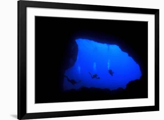 Into Darkness: Underwater Cave Scuba Diving Silhouettes-Rich Carey-Framed Photographic Print