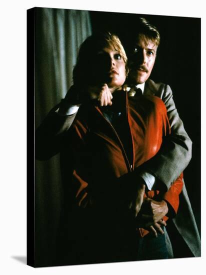 INTO THE NIGHT, 1984 directed by JOHN LANDIS Michelle Pfeiffer and David Bowie (photo)-null-Stretched Canvas