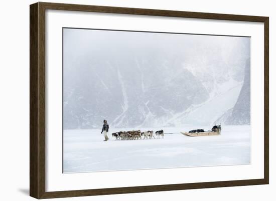 Inuit Hunter Walking His Dog Team on the Sea Ice in a Snow Storm, Greenland, Denmark, Polar Regions-Louise Murray-Framed Photographic Print
