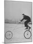 Inventor Maurice Steinlauf Riding Eccentric Bike with Roving Front Wheel-Wallace Kirkland-Mounted Photographic Print