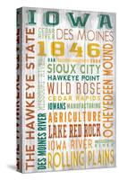 Iowa - Barnwood Typography-Lantern Press-Stretched Canvas