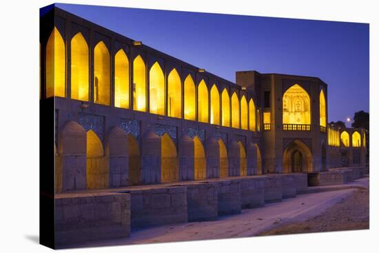 Iran, Esfahan, Si-O-Seh Bridge, Dawn-Walter Bibikow-Stretched Canvas