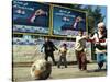 Iraqi Boys Play Soccer Below the Poster Reading "To Grant Iraqi Children Better Iraq"-null-Stretched Canvas