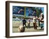 Iraqi Boys Play Soccer Below the Poster Reading "To Grant Iraqi Children Better Iraq"-null-Framed Photographic Print