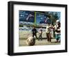 Iraqi Boys Play Soccer Below the Poster Reading "To Grant Iraqi Children Better Iraq"-null-Framed Photographic Print