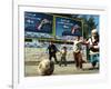 Iraqi Boys Play Soccer Below the Poster Reading "To Grant Iraqi Children Better Iraq"-null-Framed Photographic Print