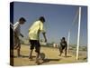 Iraqi Boys Play Soccer in a Baghdad Neighborhood-null-Stretched Canvas