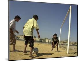 Iraqi Boys Play Soccer in a Baghdad Neighborhood-null-Mounted Photographic Print