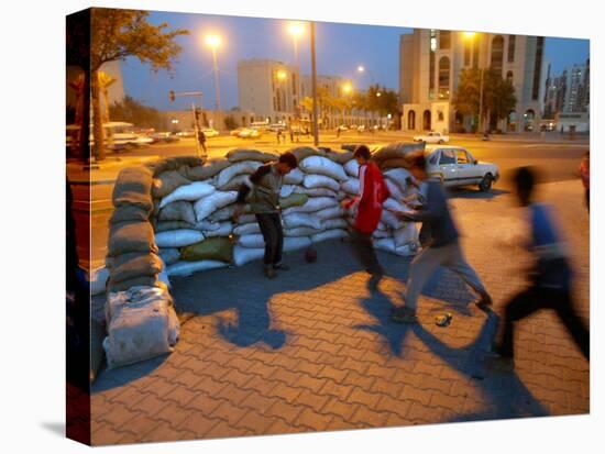 Iraqi Boys Play Soccer-null-Stretched Canvas