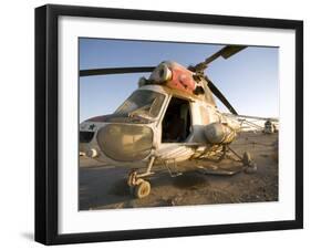 Iraqi Helicopter Sits on the Flight Deck Abandoned at Camp Warhorse-Stocktrek Images-Framed Photographic Print