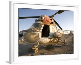 Iraqi Helicopter Sits on the Flight Deck Abandoned at Camp Warhorse-Stocktrek Images-Framed Photographic Print