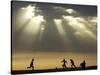 Iraqi Kurdish Boys Play Football as the Sun Sets-null-Stretched Canvas