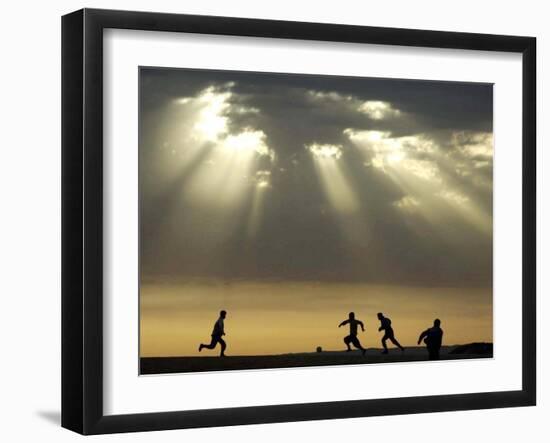 Iraqi Kurdish Boys Play Football as the Sun Sets-null-Framed Photographic Print