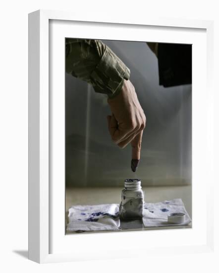 Iraqi Security Forces Member Inks His Finger after Casting His Vote at a Polling Center in Iraq-null-Framed Photographic Print