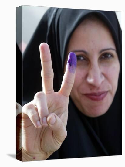 Iraqi Woman Holds Up Her Purple Finger, Indicating She Has Just Voted in Southern Iraq-null-Stretched Canvas