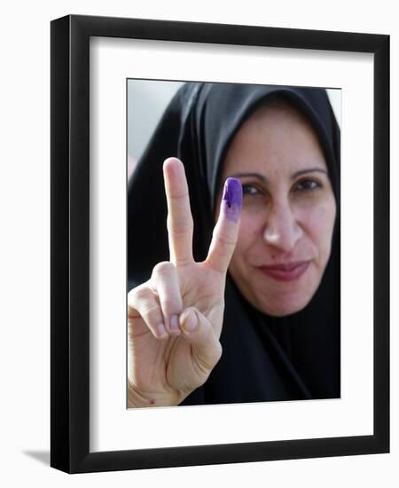 Iraqi Woman Holds Up Her Purple Finger, Indicating She Has Just Voted in Southern Iraq-null-Framed Photographic Print