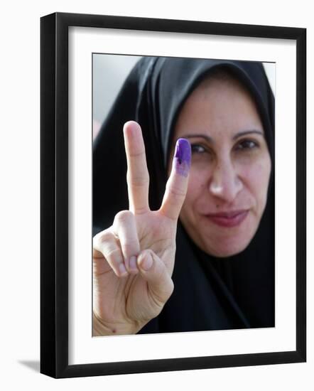 Iraqi Woman Holds Up Her Purple Finger, Indicating She Has Just Voted in Southern Iraq-null-Framed Photographic Print