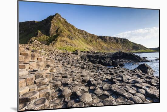 Ireland, County Antrim, Bushmills, Giants Causeway, basalt rock formation-Walter Bibikow-Mounted Photographic Print