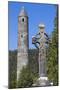 Ireland, County Wicklow, Glendalough, Celtic cross and Round Tower-Walter Bibikow-Mounted Photographic Print