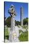 Ireland, County Wicklow, Glendalough, Celtic cross and Round Tower-Walter Bibikow-Stretched Canvas