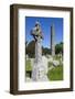 Ireland, County Wicklow, Glendalough, Celtic cross and Round Tower-Walter Bibikow-Framed Photographic Print