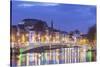 Ireland, Dublin, Hapenny Bridge over the River Liffey, dusk-Walter Bibikw-Stretched Canvas