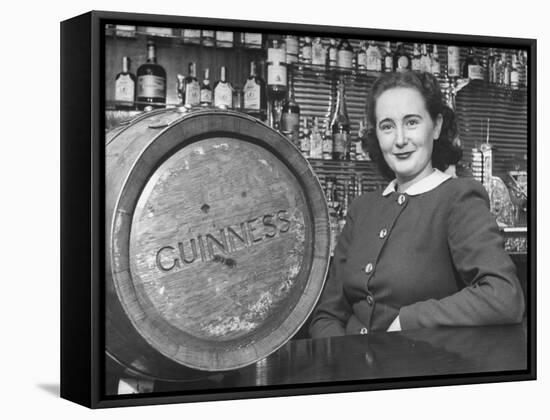 Irish Barmaid at Airport Bar with Keg of Guinness Beer-Nat Farbman-Framed Stretched Canvas