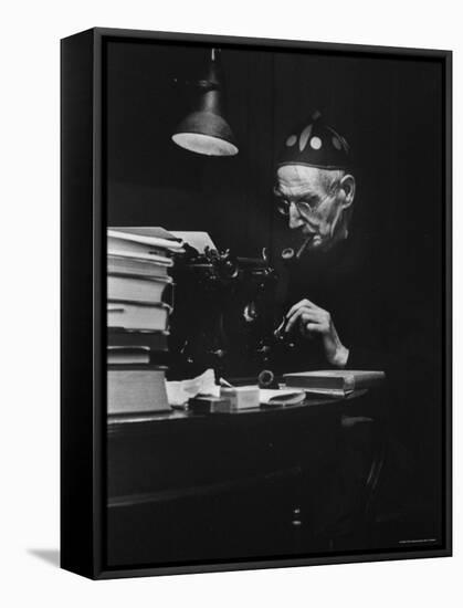 Irish Playwright Sean O'Casey with Pipe in His Mouth as He Works at His Typewriter at Home-Gjon Mili-Framed Stretched Canvas