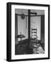 Iron Woodstove with a Ladder Backed Wooden Armchair in a Restored Shaker Parlor-John Loengard-Framed Photographic Print