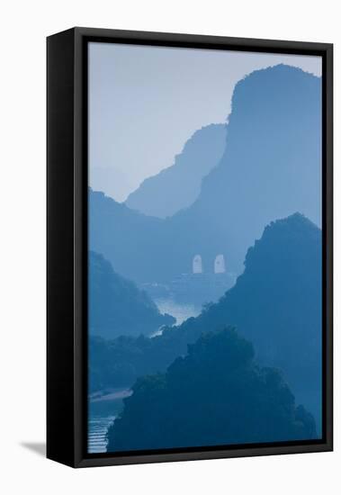 Islands and boats in the Pacific Ocean, Ha Long Bay, Quang Ninh Province, Vietnam-null-Framed Stretched Canvas