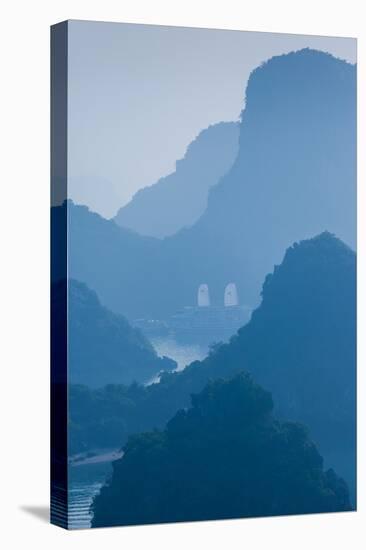 Islands and boats in the Pacific Ocean, Ha Long Bay, Quang Ninh Province, Vietnam-null-Stretched Canvas