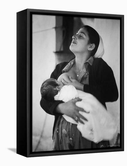 Israeli Mother Breast Feeding Her Baby-Paul Schutzer-Framed Stretched Canvas