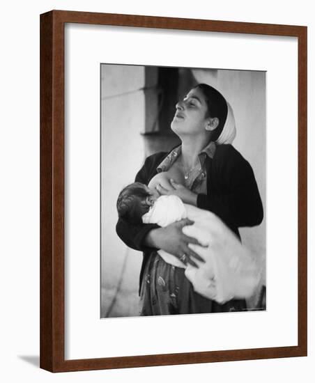 Israeli Mother Breast Feeding Her Baby-Paul Schutzer-Framed Photographic Print