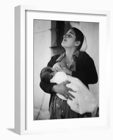 Israeli Mother Breast Feeding Her Baby-Paul Schutzer-Framed Photographic Print