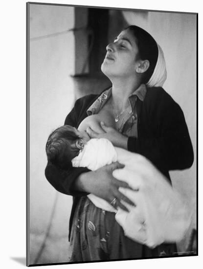 Israeli Mother Breast Feeding Her Baby-Paul Schutzer-Mounted Photographic Print