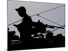 Israeli Soldier Prays on Top of a Tank Just Outside the Southern Gaza Strip-null-Mounted Photographic Print