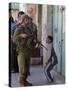 Israeli Soldier Tells a Palestinian Boy to Leave the Scene Following a Knife Attack-null-Stretched Canvas