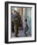 Israeli Soldier Tells a Palestinian Boy to Leave the Scene Following a Knife Attack-null-Framed Photographic Print